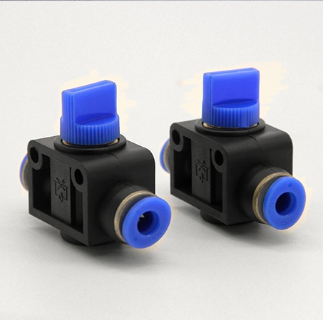 Two inline pneumatic hand valves with blue rotary handles and push-in tube ports